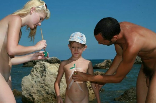 Family summer holiday of nudists on the seashore - Purenudism family [Pure naturism]
